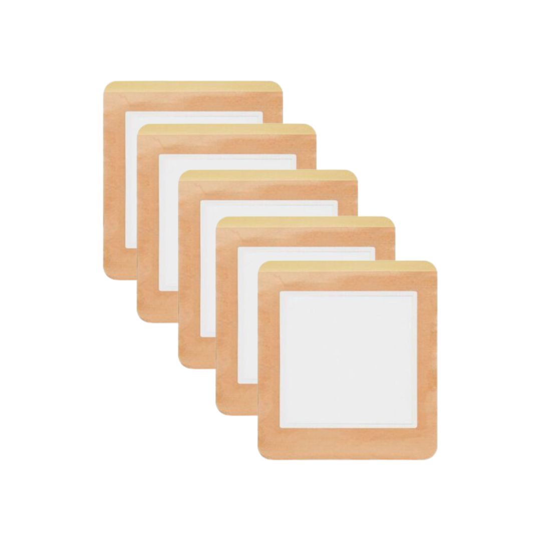 Set of five Orthease disposable castor oil patches arranged in a stack